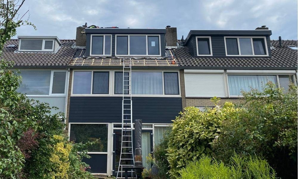 Wat kost een plat dak herstellen in Sneek?